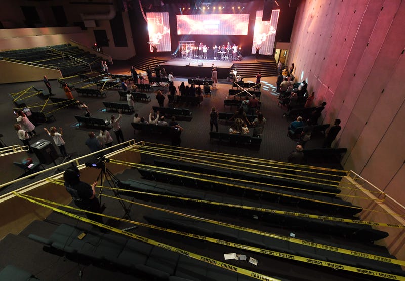 Sections of seating are cordoned off with caution tape during a service at the International Church of Las Vegas on May 31, 2020 in Las Vegas, Nevada.