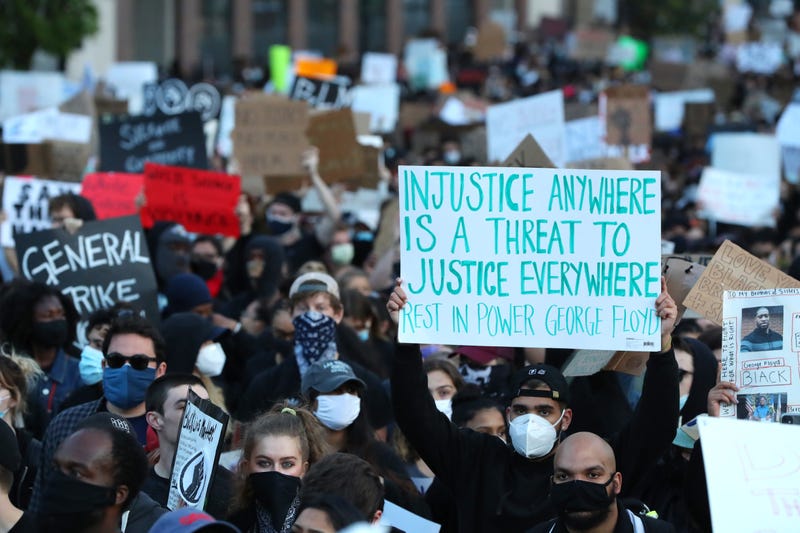 Demonstrators protest in response to the recent death of George Floyd on May 31, 2020 in Boston, Massachusetts.