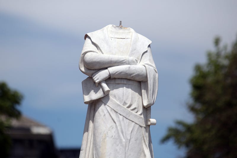 A statue depicting Christopher Columbus is seen with its head removed at Christopher Columbus Waterfront Park on June 10, 2020 in Boston, Massachusetts. 