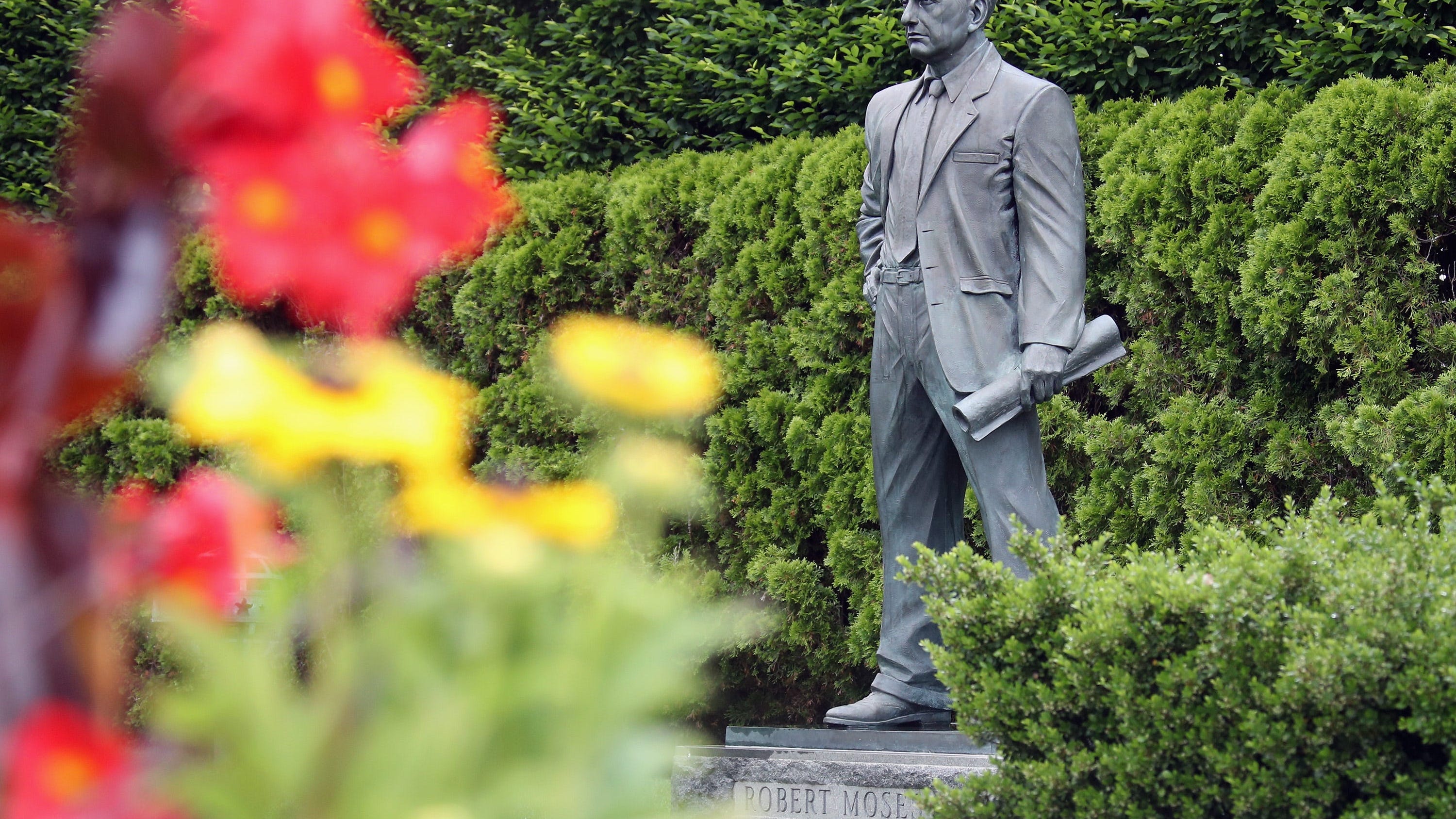 Long Island protesters demand removal of Robert Moses statue