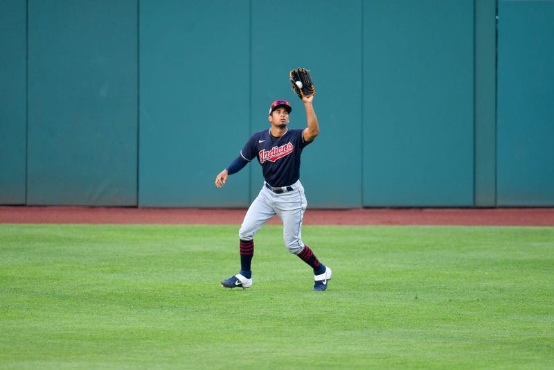 CLEVELAND, OHIO - JULY 09: Center fielder Oscar Mercado #35 of the Cleveland Indians catches a fly ball off the bat of Domingo Santana during the second inning of an intrasquad game during summer workouts at Progressive Field on July 09, 2020 in Cleveland