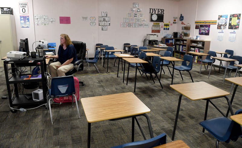  Dana Dyer teaches an online seventh grade algebra class from her empty classroom at Walter Johnson Junior High School on the first day of distance learning for the Clark County School District amid the spread of the coronavirus (COVID-19) on August 24, 2