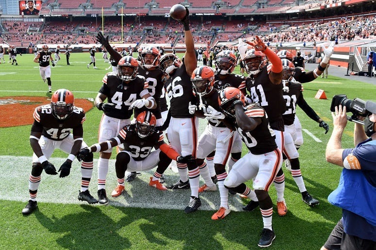 Malcolm Smith #56 of the Cleveland Browns celebrates with his teammates after an interception against Dwayne Haskins #7 of the Washington Football Team