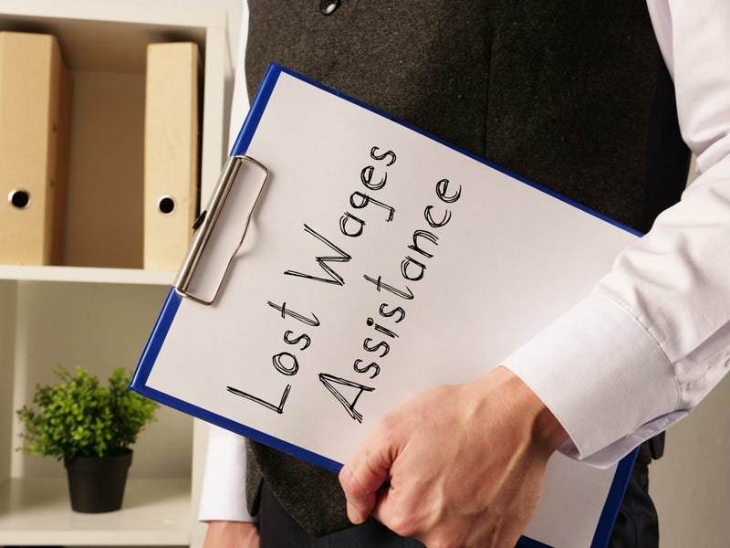 Lost Wages Assistance is shown on a conceptual business photo