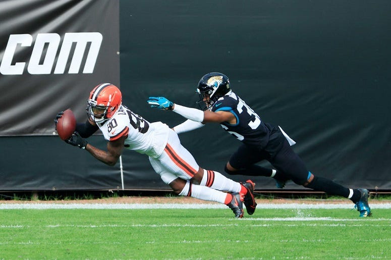 Jarvis Landry scores a touchdown in the first quarter against the Jaguars