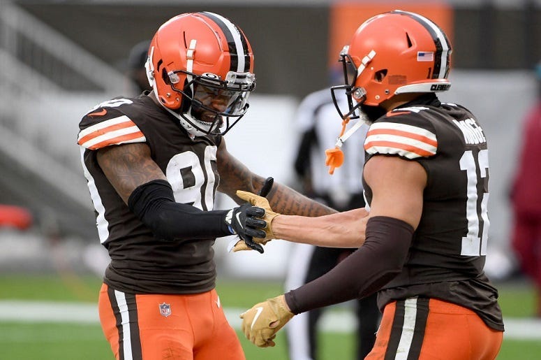 Rashard Higgins and KhaDarel Hodge celebrate a touchdown against the Pittsburgh Steelers