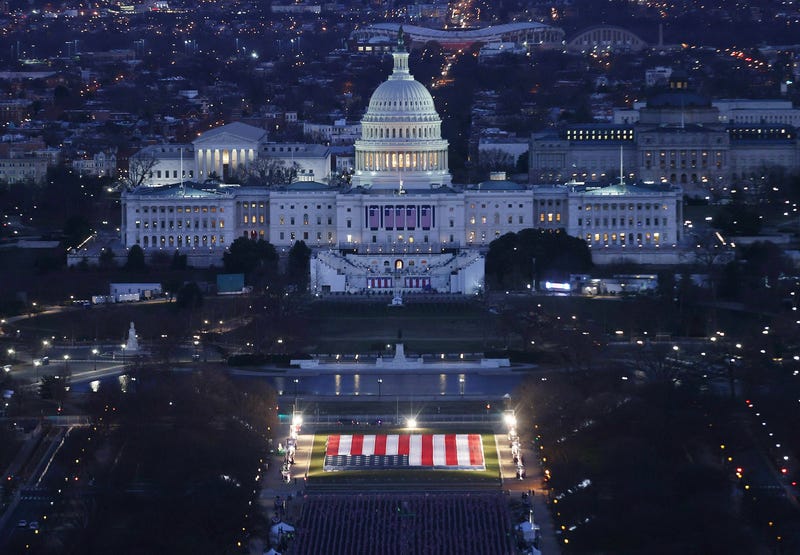The U.S. Capitol Building is prepared for the inauguration ceremonies for President-elect Joe Biden as the "Field of Flags" are placed on the ground on the National Mall on January 18, 2021 in Washington, DC.