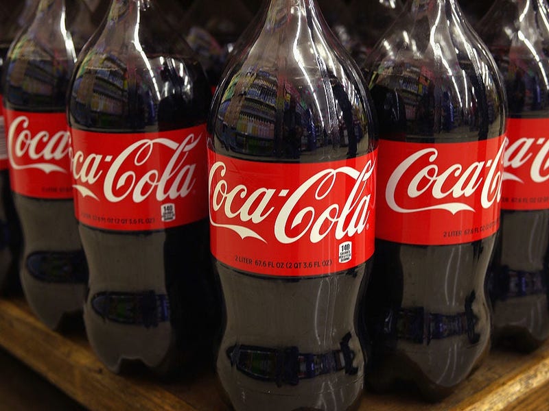 Bottles of Coca-Cola soda are offered for sale at a grocery store on April 17, 2012 in Chicago, Illinois. 