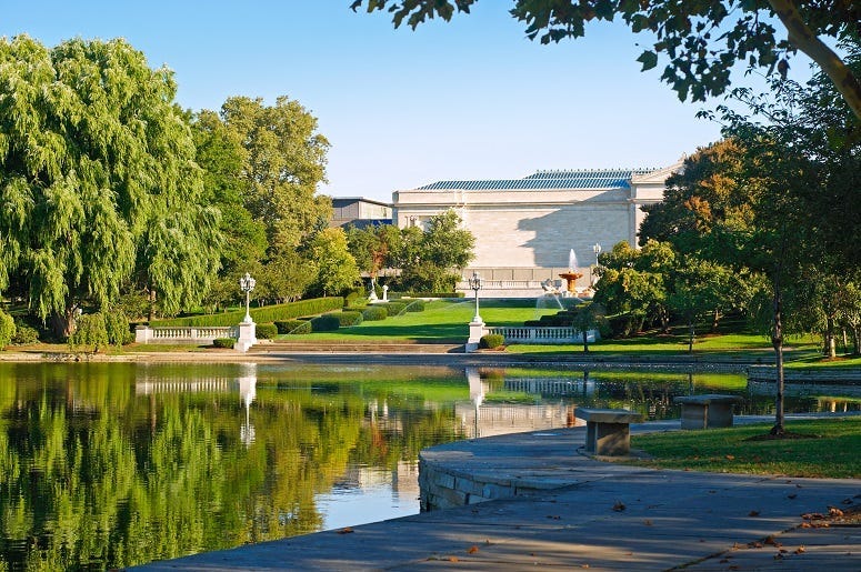The Cleveland Museum of Art and trees reflected in Wade Lagoon, Cleveland Ohio