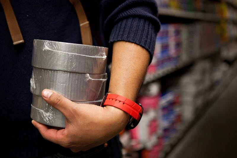 A man shops for duct tape at Home Depot.