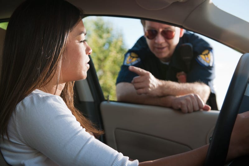 Woman getting pulled over