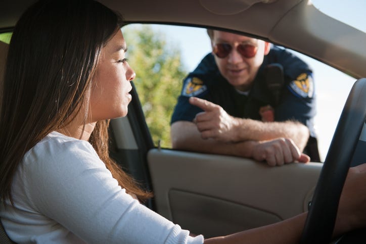 Police Pulling a Woman Over