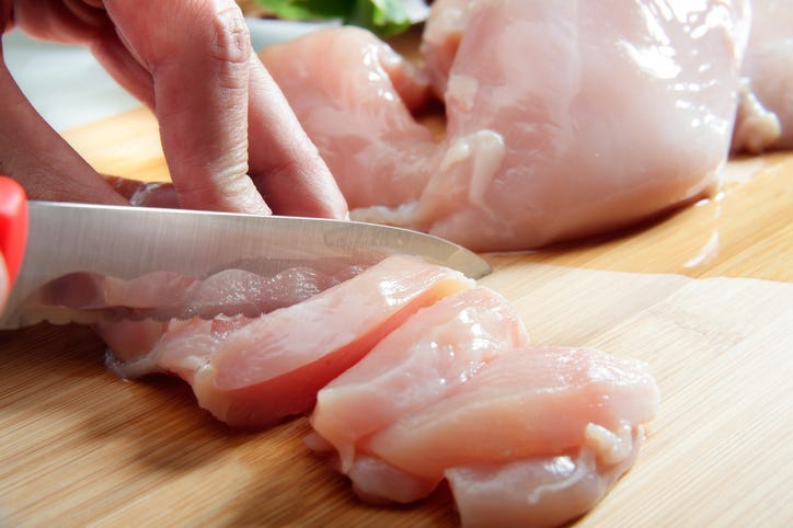 cutting chicken