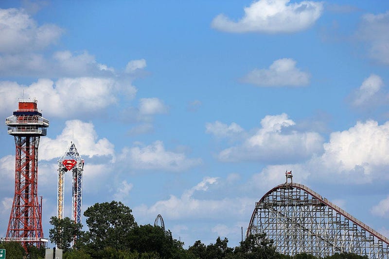 A view of The Texas Giant roller coaster (R) at Six Flags Over Texas on July 22, 2013 in Arlington, Texas