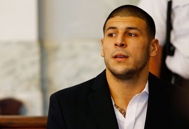 Aaron Hernandez sits in the courtroom of the Attleboro District Court during his hearing