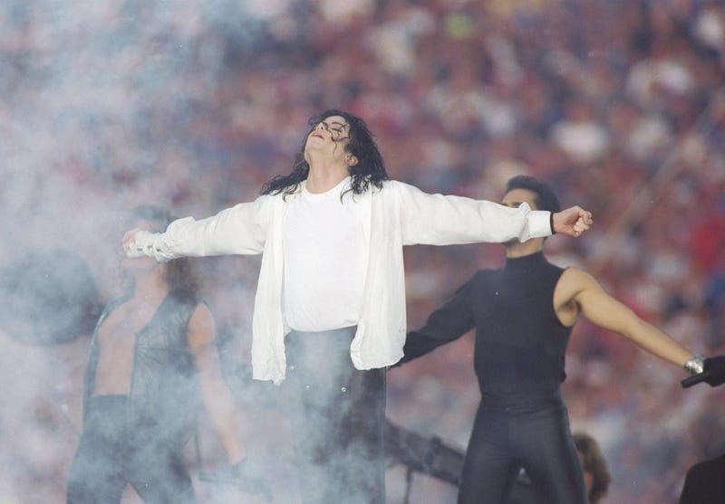 Entertainer Michael Jackson sings at half-time during the Super Bowl X XVII