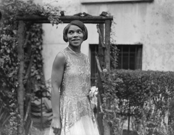 America contralto Marian Anderson (1897 - 1993) at home. Anderson was the first African-American singer to perform at the Metropolitan Opera House in New York.
