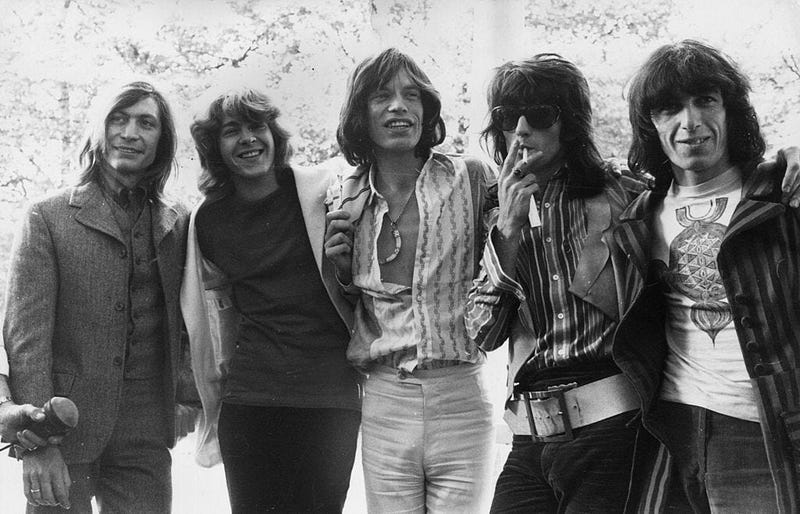  20-year-old Mick Taylor, former lead guitarist of the John Mayall rhythm and blues group replaces Brian Jones as the new member of the Rolling Stones. The group pose in Hyde Park, London - (from left to right) Charlie Watts, Mick Taylor, Mick Jagger, Kei