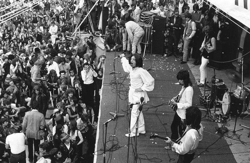 British rock singer Mick Jagger, performing with The Rolling Stones, at the free open-air concert in Hyde Park given in memory of guitarist Brian Jones who died two days earlier. 
