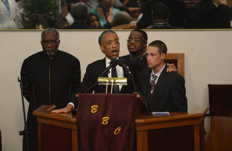 Reverend Al Sharpton introduces Ramsey Orta, the civilian who video recorded the incident with the NYPD and the late Eric Garner, during the funeral service for Eric Garner held at Bethel Baptist Church on July 23, 2014 in the Brooklyn borough of New York
