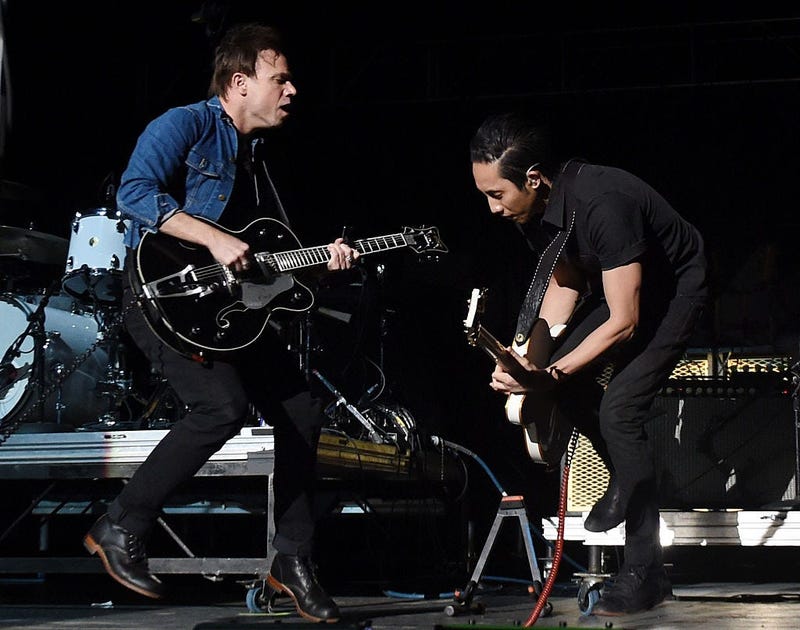 LAS VEGAS, NV - DECEMBER 12: Frontman Mikel Jollett (L) and guitarist Steven Chen of The Airborne Toxic Event perform during X107.5's Holiday Havoc 2014 show at The Joint inside the Hard Rock Hotel & Casino on December 12, 2014 in Las Vegas, Nevada. (Phot