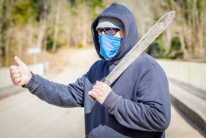 Man with machete try to stop car