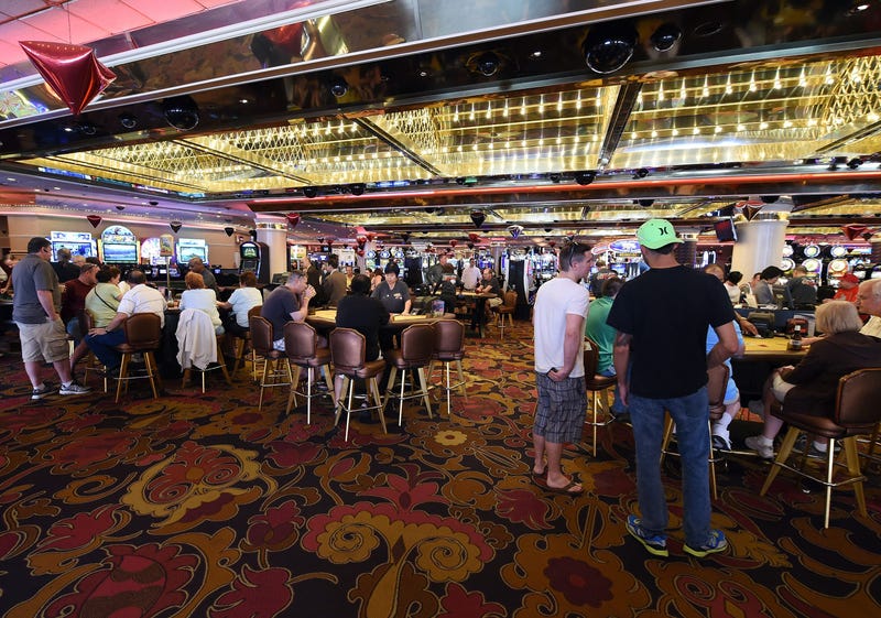 Guests gamble on the casino floor at the Riviera Hotel & Casino on April 30, 2015 in Las Vegas, Nevada.