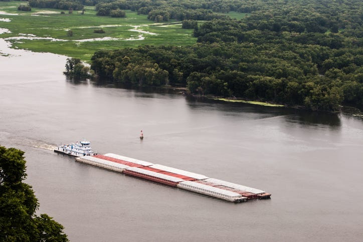 Mississippi River closed after barges collide, towboat sinks--three missing