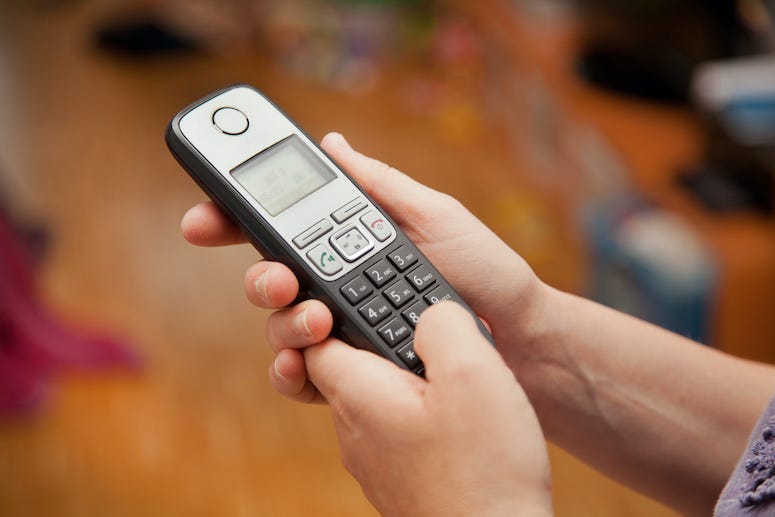 Cordless Phone, Woman Typing Numbers