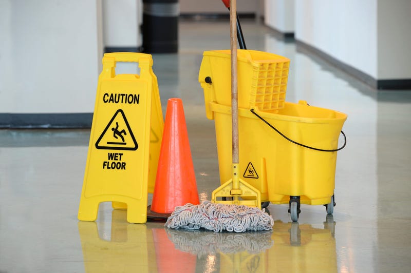 Mop bucket, orange cone, cleaning supplies