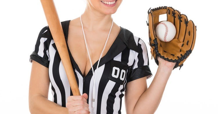 Young Beautiful Referee Wearing Baseball Glove And Holding Baseball Bat