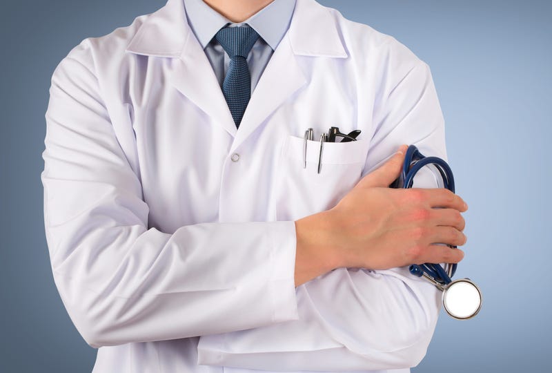 Doctor, Arms Crossed, Blue Background