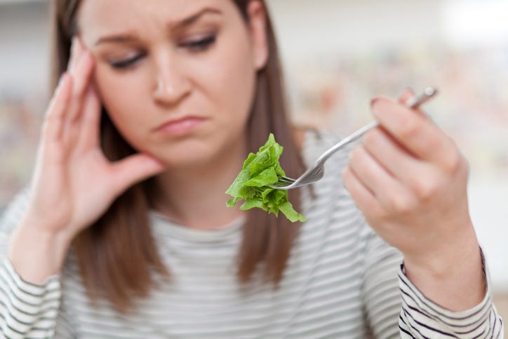 Woman Refusing Food