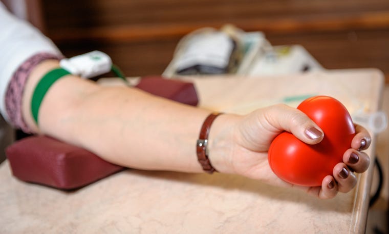 A woman donating blood