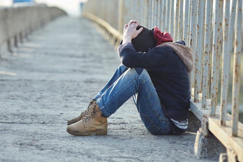 Young person on bridge