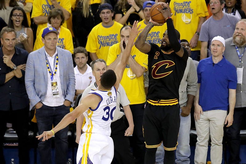 OAKLAND, CA - JUNE 19: Kyrie Irving #2 of the Cleveland Cavaliers shoots a three-point basket against the Golden State Warriors in Game 7 of the 2016 NBA Finals at ORACLE Arena on June 19, 2016 in Oakland, California. NOTE TO USER: User expressly acknowle