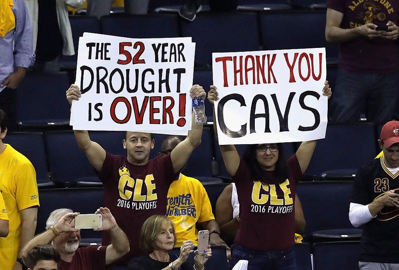 OAKLAND, CA - JUNE 19: Cleveland Cavaliers fans hold signs after the Cavaliers defeated the Golden State Warriors 93-89 in Game 7 of the 2016 NBA Finals at ORACLE Arena on June 19, 2016 in Oakland, California. NOTE TO USER: User expressly acknowledges and