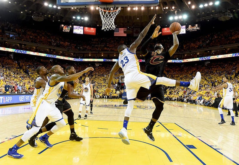 OAKLAND, CA - JUNE 19: LeBron James #23 of the Cleveland Cavaliers takes a shot against Draymond Green #23 of the Golden State Warriors in Game 7 of the 2016 NBA Finals at ORACLE Arena on June 19, 2016 in Oakland, California. NOTE TO USER: User expressly