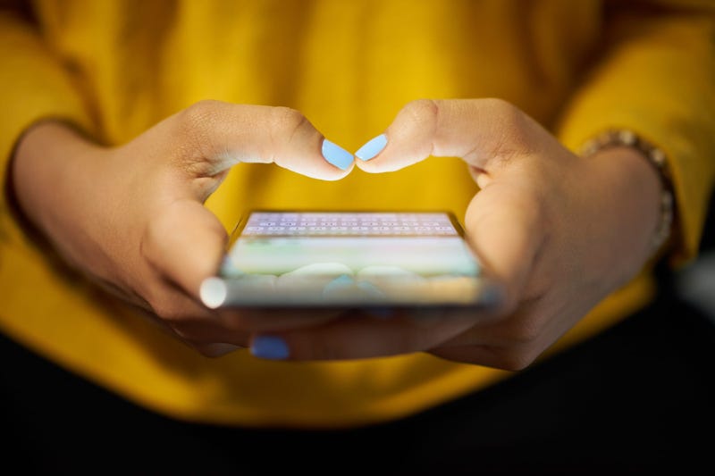 A woman on her phone.