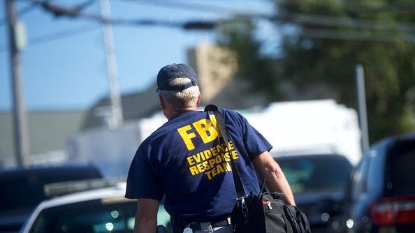 Man, 43, arrested for hoarding masks, coughing on FBI agents in Brooklyn