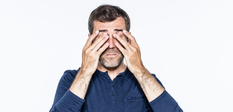 rubbing eyes