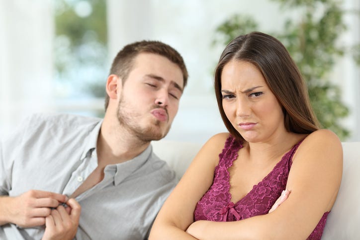 Man Annoying Woman