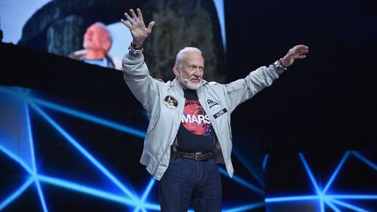 Watch Buzz Aldrin punch lunar lunatic in the face!