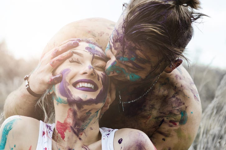 happy boyfriend and girlfriend, man kissing the girl's head