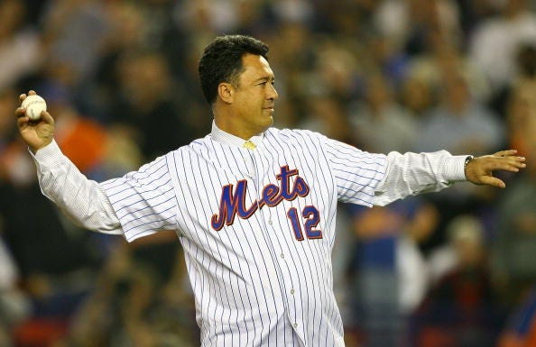  Ron Darling formerly of the New York Mets throws out the first pitch of game seven of the NLCS