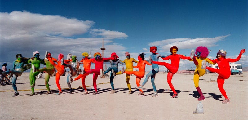 e "Painted People" of San Francisco and New York, dance while wearing only paint for clothing September 2, 2000 at the15th annual Burning Man festival in the Black Rock Desert near Gerlach, Nevada.