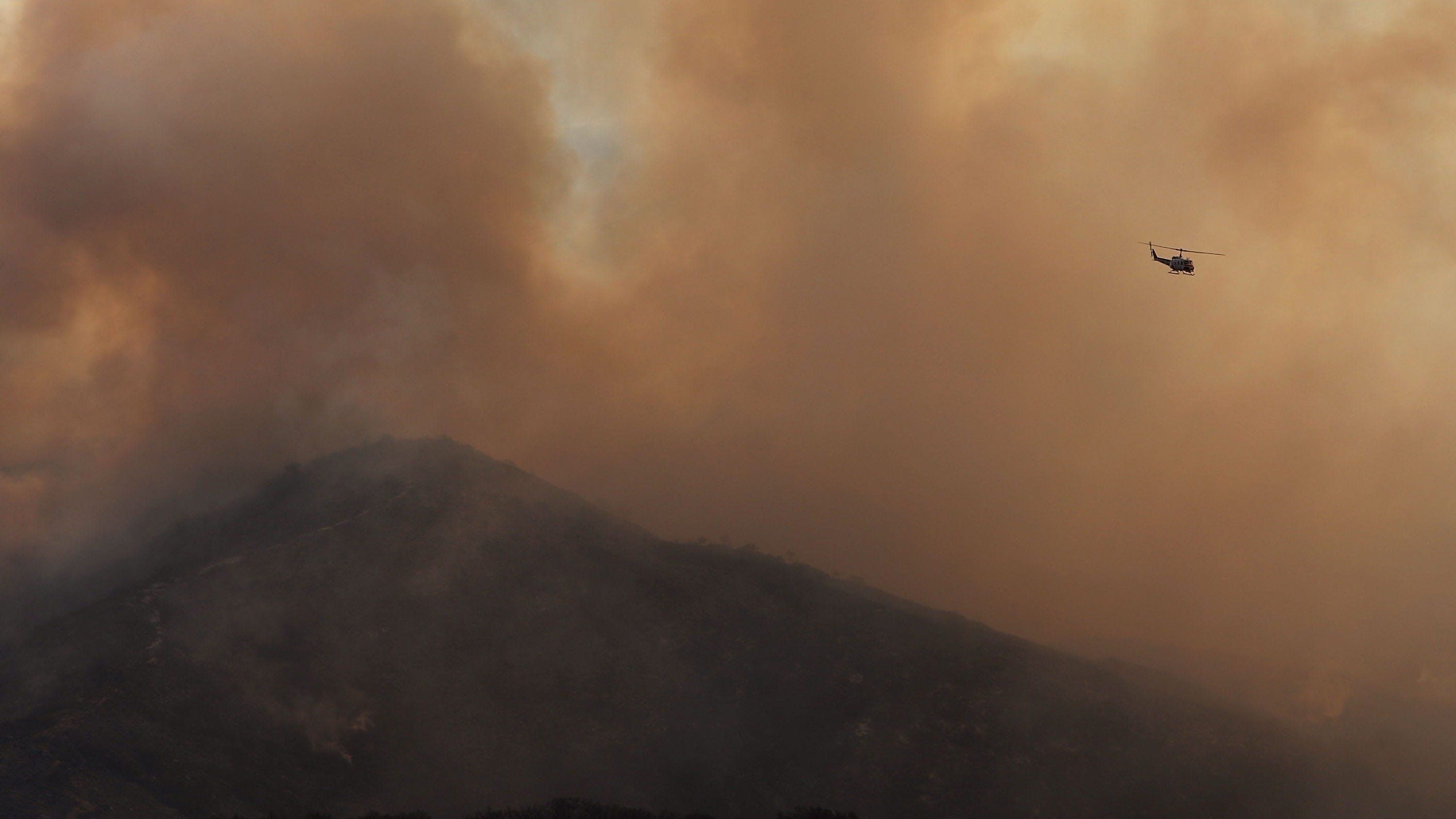 CAL FIRE Helicopter Crashes During Water Drop, Pilot Killed