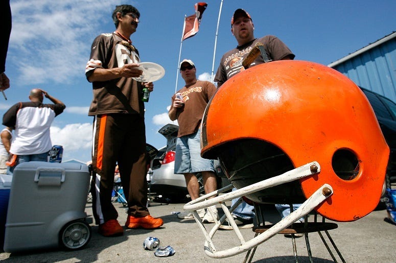 Fans tailgate before the game