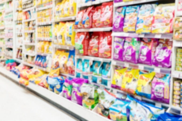 Pet food product department in supermarket.