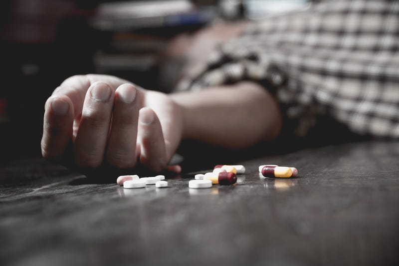 Young person passed out or dead from drug overdose.